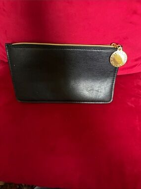 Stella McCartney Black Leather Zip Pouch with Gold Medallion